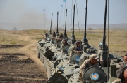 Колонна БТР-80А Аэромобильных войск ВС Республики Казахстан после завершения специальной операции
